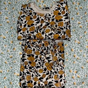 Floral pant set with drawstring on bottom of sweatshirt. Adorable buttons.